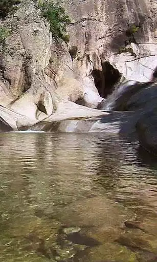Play APK A river in the rocks  and enjoy A river in the rocks with UptoPlay com.topwallpaperz.ariverintherocks