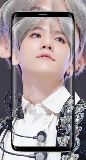 Play Baek hyun Cute Wallpaper  and enjoy Baek hyun Cute Wallpaper with UptoPlay