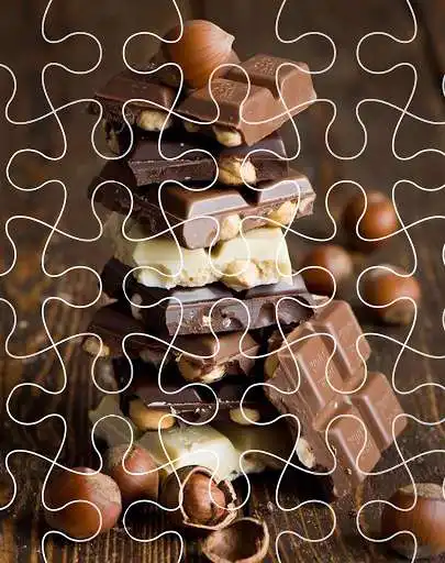 Play Chocolate Jigsaw Puzzles Games as an online game Chocolate Jigsaw Puzzles Games with UptoPlay