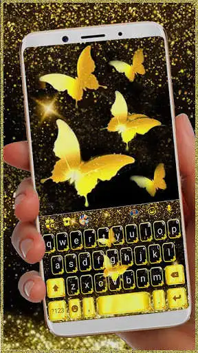 Play Golden Butterfly Keyboard Theme  and enjoy Golden Butterfly Keyboard Theme with UptoPlay