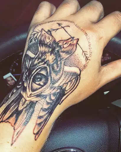 Play APK Hand Tattoo Designs  and enjoy Hand Tattoo Designs with UptoPlay com.HandTattooDesigns