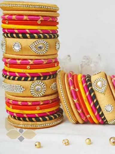 Play APK Latest Silk Thread Bangles Designs  and enjoy Latest Silk Thread Bangles Designs with UptoPlay com.bmksservices.silkthreadbanglesdesigns