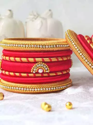Play APK Latest Silk Thread Bangles Designs  and enjoy Latest Silk Thread Bangles Designs with UptoPlay com.bmksservices.silkthreadbanglesdesigns