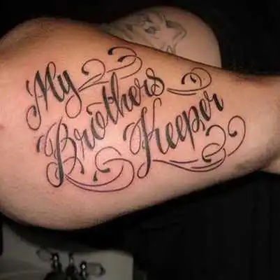 Play lettering tattoo