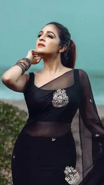 Play Malavika Wales Wallpapers HD  and enjoy Malavika Wales Wallpapers HD with UptoPlay