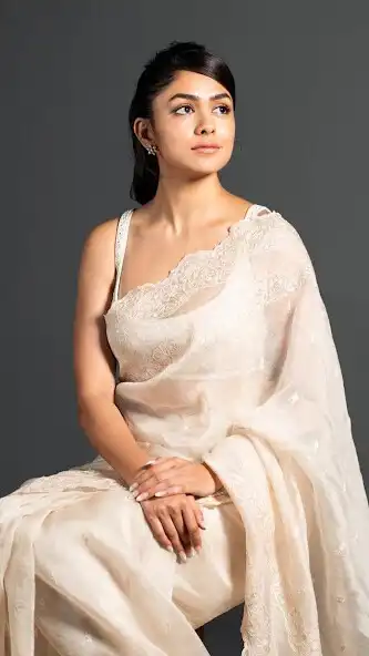 Play Mrunal Thakur Wallpapers HD  and enjoy Mrunal Thakur Wallpapers HD with UptoPlay